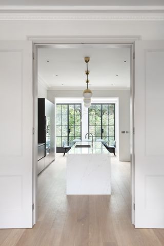 contemporary kitchen wit black metal doors and white internal doors by IQ Glass