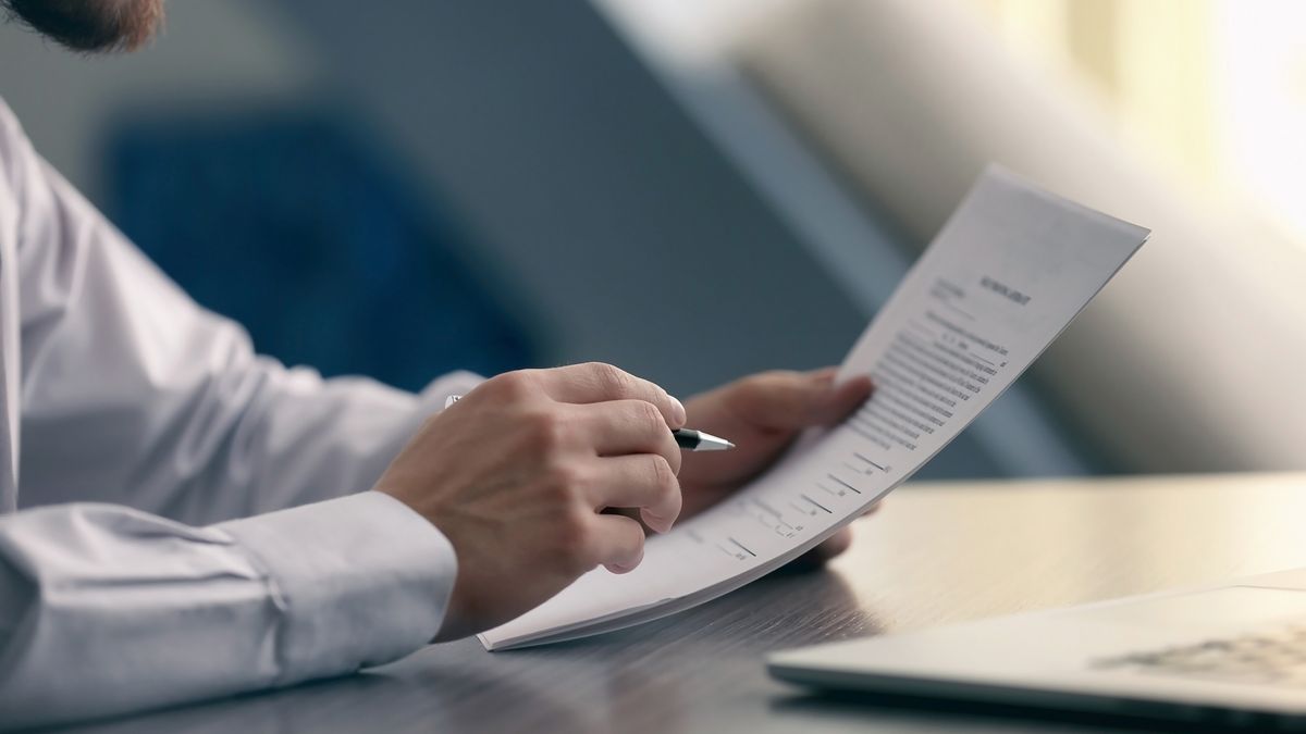 Man signing a contract