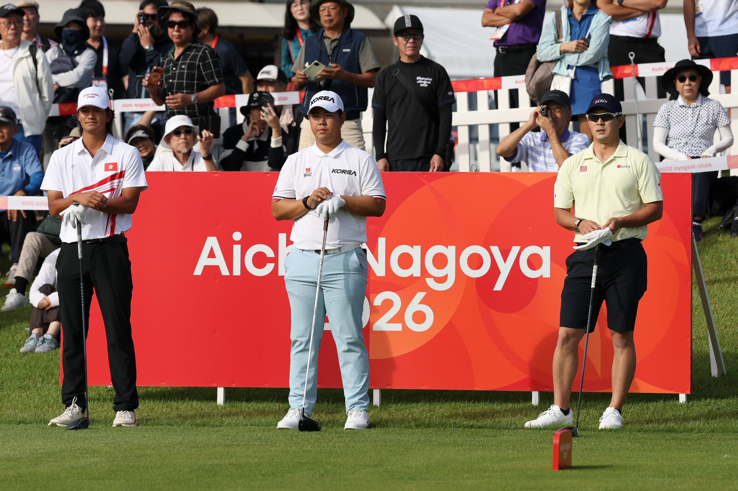 (L to R) Taichi Kho, Tom Kim and Keita Nakajima line up on the first tee at the 2026 Asian Games