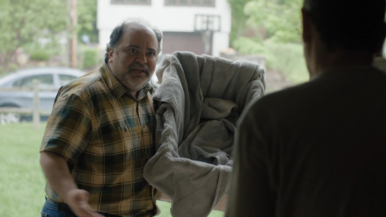 Man trying to buy Fab Four figures from Ron in The Chair Company Season 1