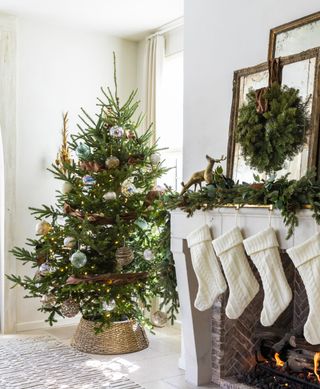 Christmas tree in a small living room by Marie Flanigan