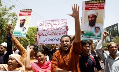 Osama bin Laden supporters during a protest: As more information unfolds about Sunday's raid, critics say the Al Qaeda leader should have been captured not killed.