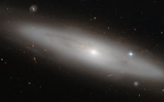 Lenticular Galaxy NGC 4866 space wallpaper