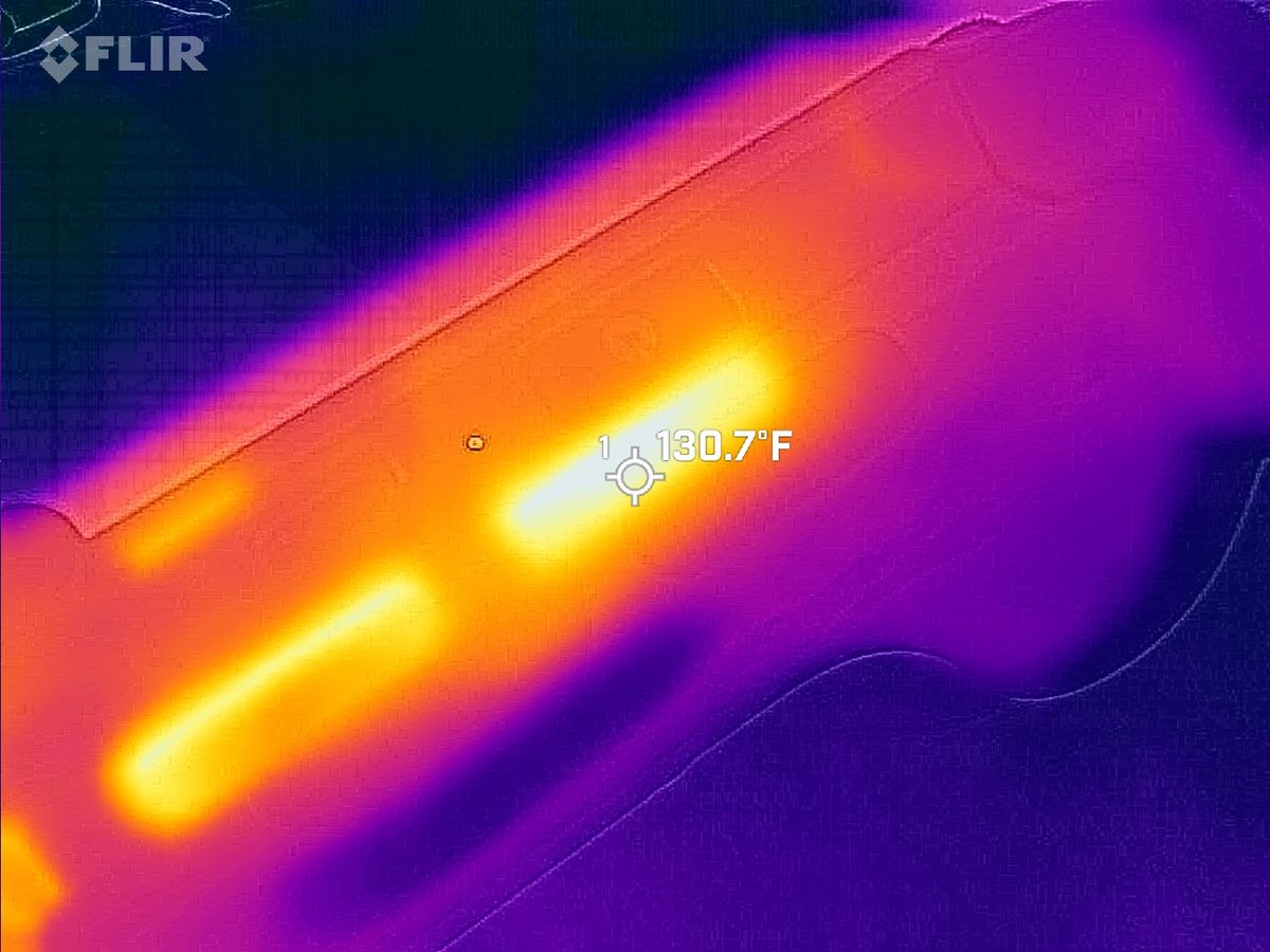 Macro thermal scan focused directly on the top exhaust vents, highlighting peak heat expulsion from the internal cooling system at a hot 130.7&deg;F.