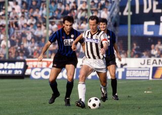 Liam Brady, playing for Ascoli, is challenged by Atalanta's Cesare Prandelli in the 1986/87 season.