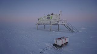 A thermotransport box sits in front of the Antarctic greenhouse EDEN ISS, which tests the ability to grow food in Mars-like conditions.