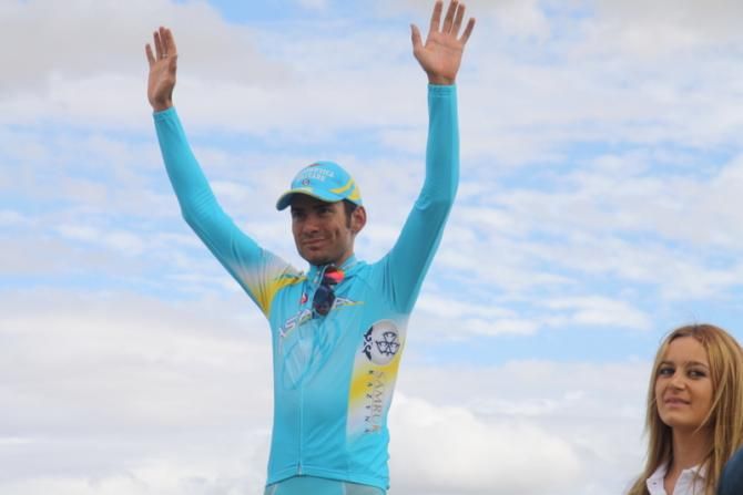 Stage 1 winner Simone Ponzi (Astana) on the podium