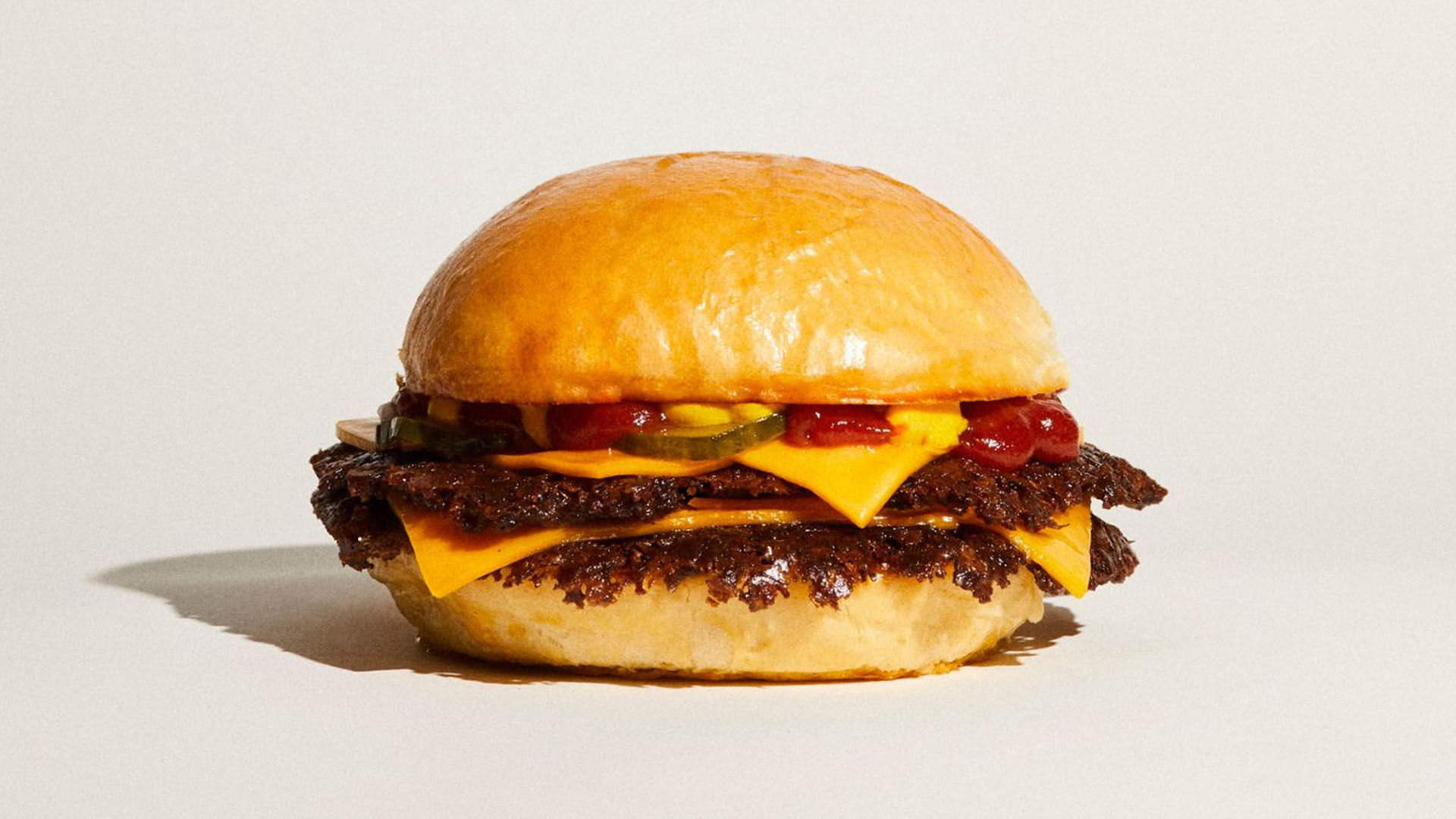 A photo of a Dumbo smash burger. 