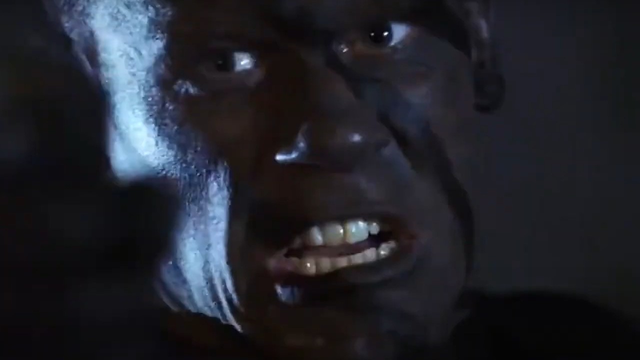 John Cena with his teeth bared in The Marine