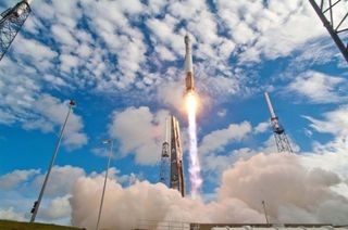 Atlas 5 rocket launches the classified NROL-38 spy satellite.