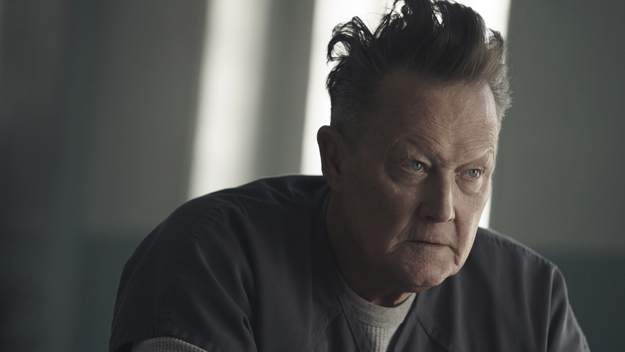 Robert Patrick's Auggie looking menacing in Peacemaker season 1