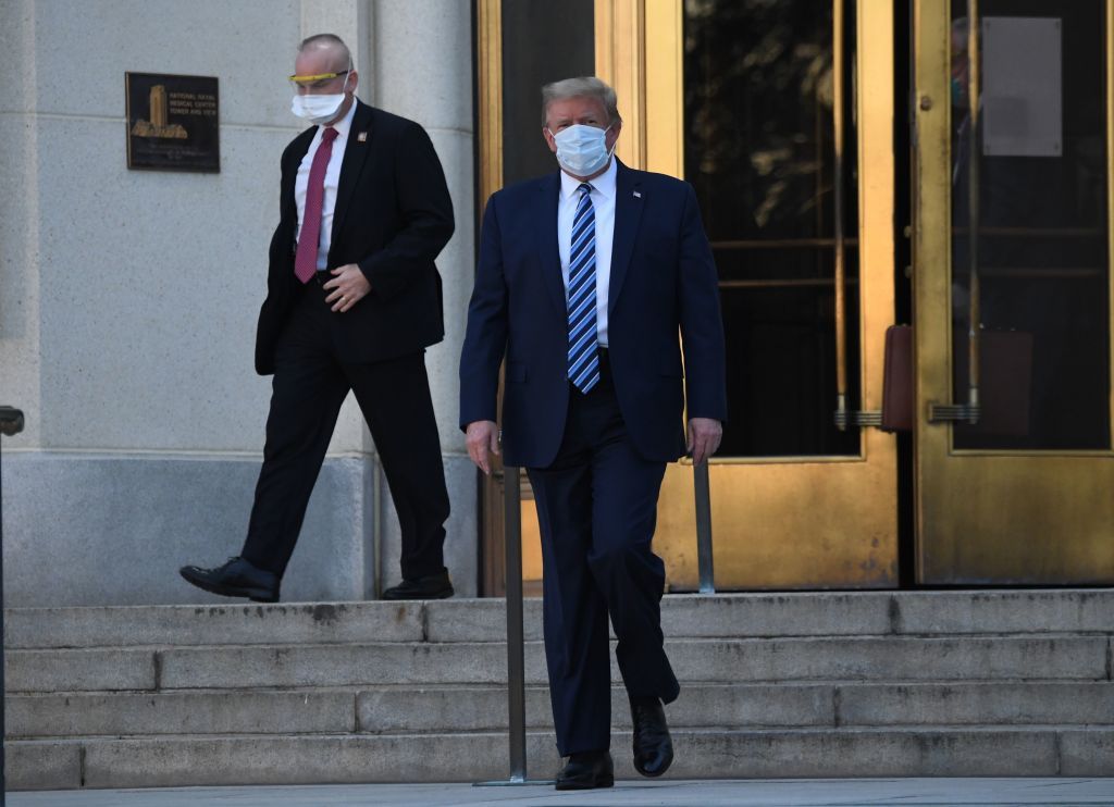 Donald Trump walks out of Walter Reed.