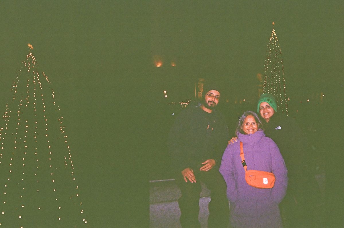 Two photos of a Christmas tree and a family taken on a Kodak Ektar H35 Half Frame film camera