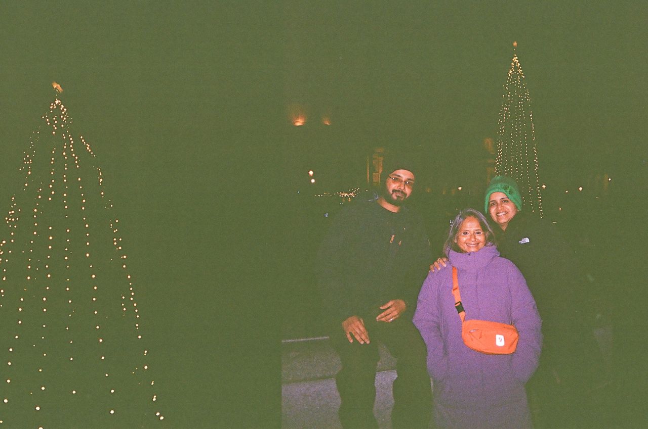 Two photos of a Christmas tree and a family taken on a Kodak Ektar H35 Half Frame film camera
