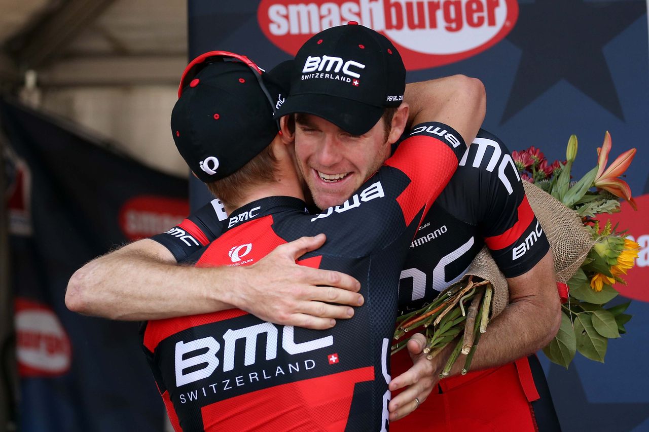 Dennis hugs teammate Brent Bookwalter