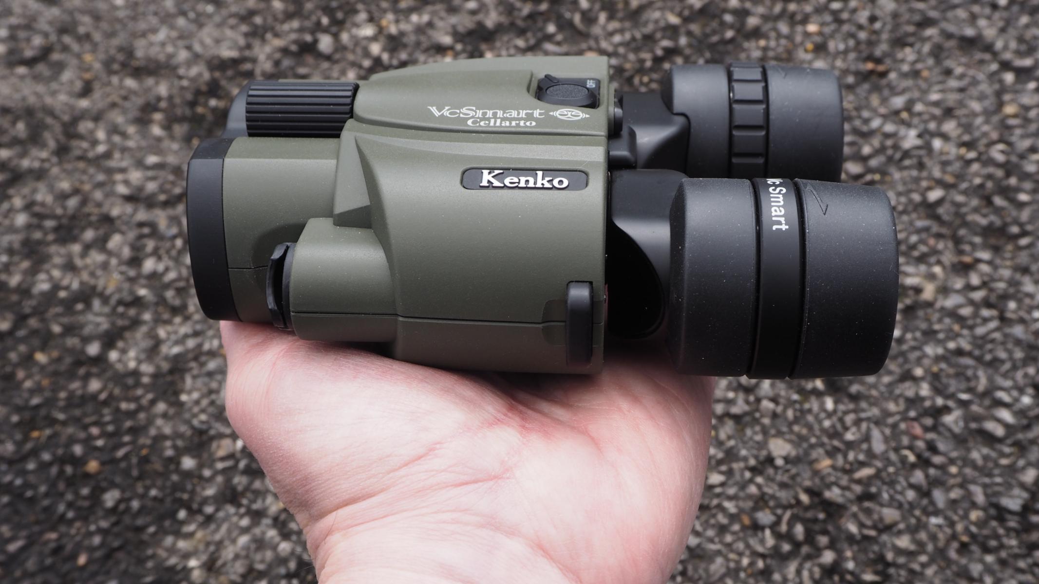 Kenko VC Smart Cellarto 10x30 WP binoculars, held over a gravel path.