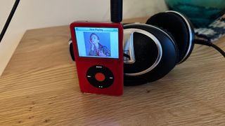 iPod Video stood up against some headphones