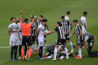 Botafogo's Gregore is sent off for a foul in the first minute of the 2024 Copa Libertadores final against Atletico Mineiro.