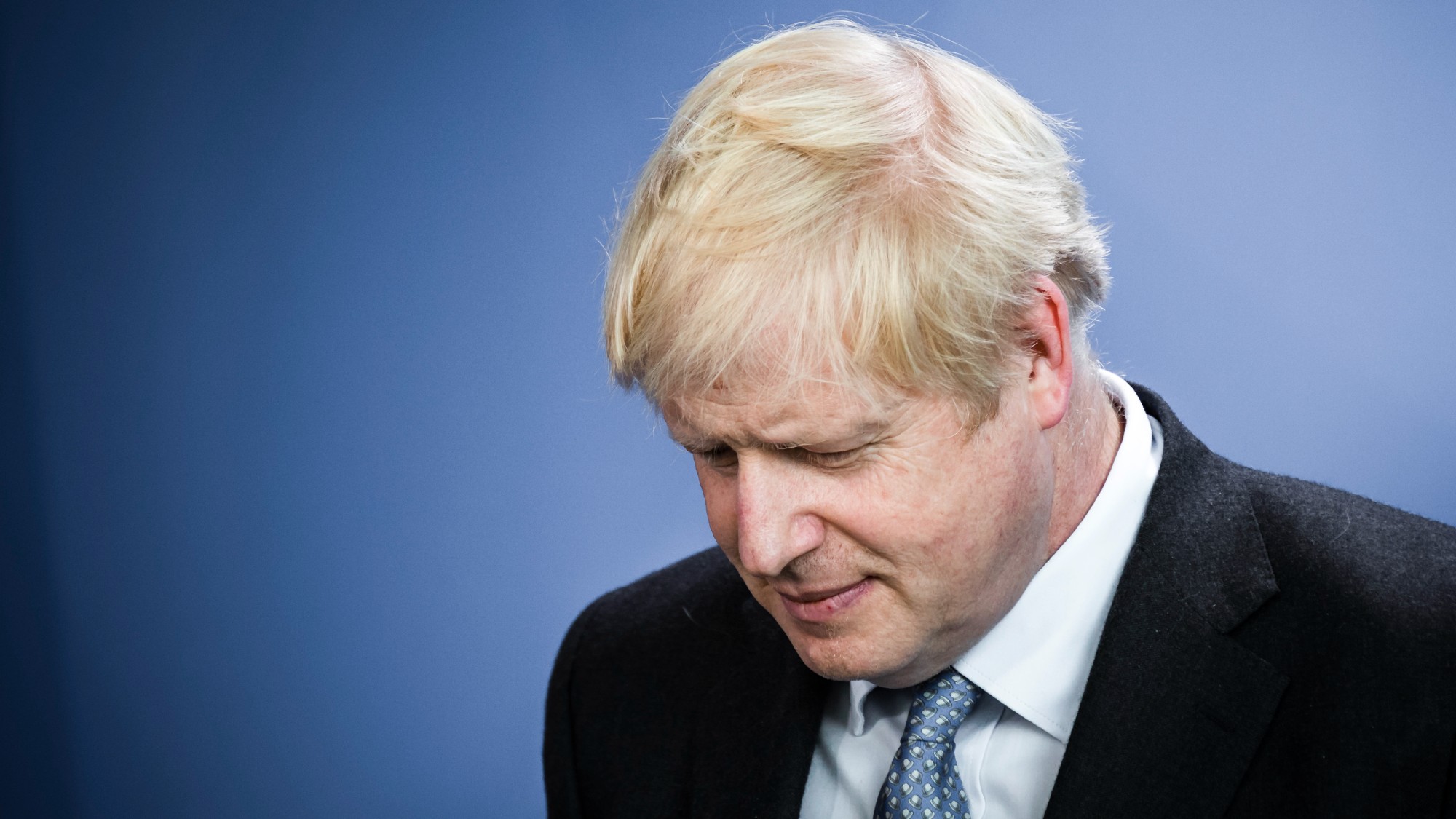 Boris Johnson looking down