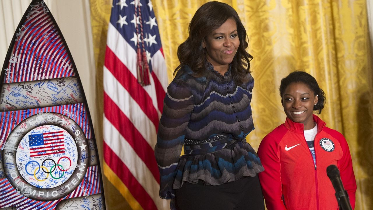 Michelle Obama&#039;s advice, US First Lady Michelle Obama and US Olympic gymnast Simone Biles during a ceremony honoring the 2016 US Olympic and Paralympic teams during an event in the East Room of the White House in Washington, DC, September 29, 2016