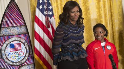 Michelle Obama's advice, US First Lady Michelle Obama and US Olympic gymnast Simone Biles during a ceremony honoring the 2016 US Olympic and Paralympic teams during an event in the East Room of the White House in Washington, DC, September 29, 2016