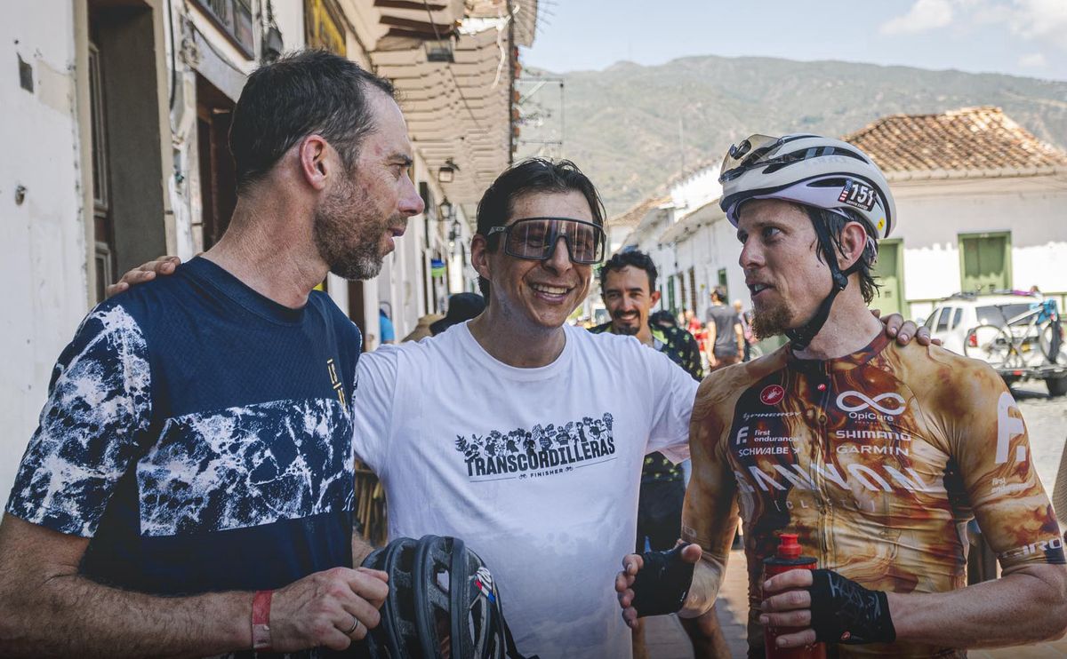 Full week self-supported race winner Griffin Easter (right) is congratulated at the finish line by non-stop winner Laurens ten Dam (left)