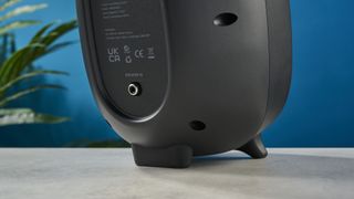 the majority d80 speakers, a pair of black egg-shaped speakers with mesh casing, HDMI, bluetooth, aux connectivity