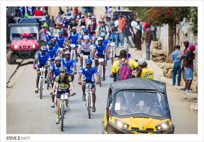 Racers roll out during a stage of the Mountain Bike Ayiti
