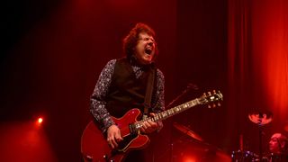 Gary Moore, live onstage at Wembley in 2006, Gibson ES-335 on fire