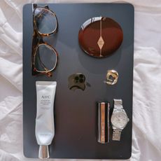 Photo of skincare products on a Macbook computer