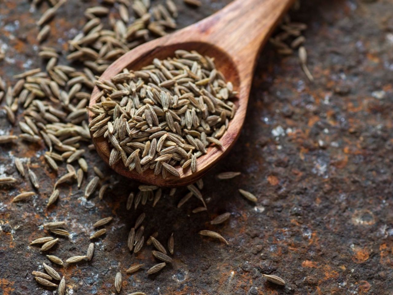 Wooden Spoonful Of Cumin Herbs