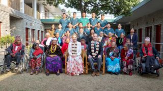 Sophie, Duchess of Edinburgh and Prince Edward, Duke of Edinburgh pose with Gurkha veterans, widows and staff on a visit to the Gurkha Welfare Trust Welfare Centre