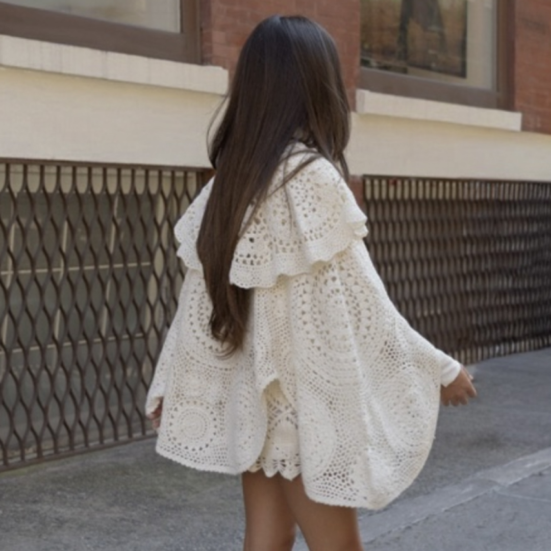 Jessica Habich Thomas wearing a white dress that's boho