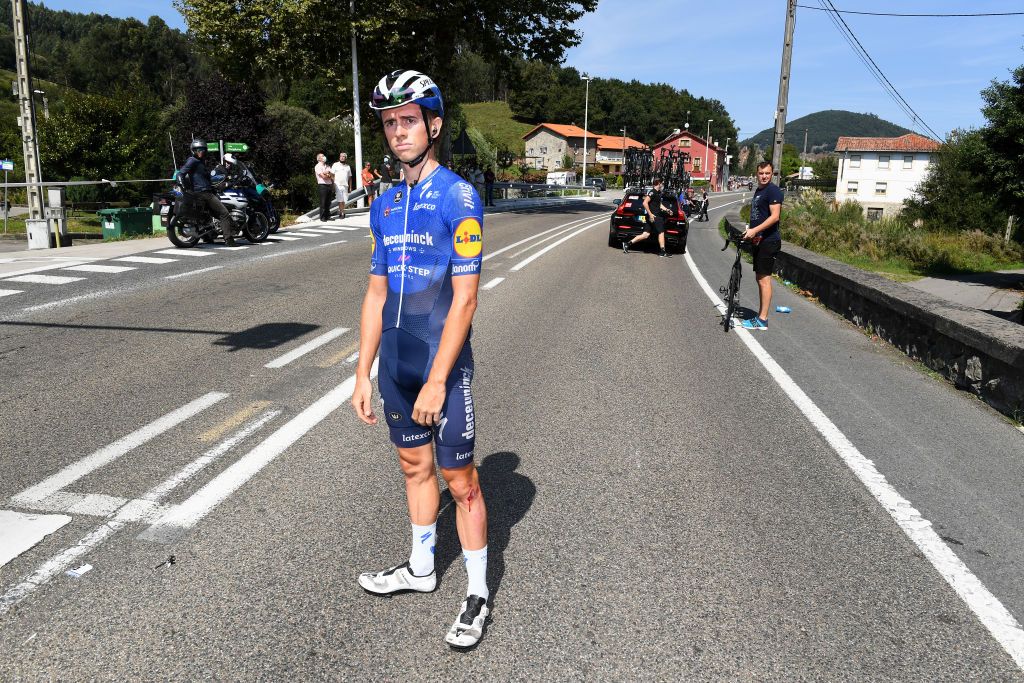SANTA CRUZ DE BEZANA SPAIN AUGUST 31 James Knox of United Kingdom and Team Deceuninck QuickStep injured after crash during the 76th Tour of Spain 2021 Stage 16 a 180km stage from Laredo to Santa Cruz de Bezana lavuelta LaVuelta21 on August 31 2021 in Santa Cruz de Bezana Spain Photo by Tim de WaeleGetty Images