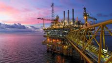 Offshore oil rig in twilight_think4photop via Getty Images