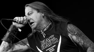 Dez Fafara onstage with DevilDriver in 2009