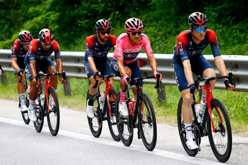 Team Ineos Ecuadorian rider Richard Carapaz 2nd R wearing the overall leaders pink jersey cycles with teammates during the 18th stage of the Giro dItalia 2022 cycling race 156 km from Borgo Valsugana to Treviso on May 26 2022 Photo by Luca Bettini AFP Photo by LUCA BETTINIAFP via Getty Images