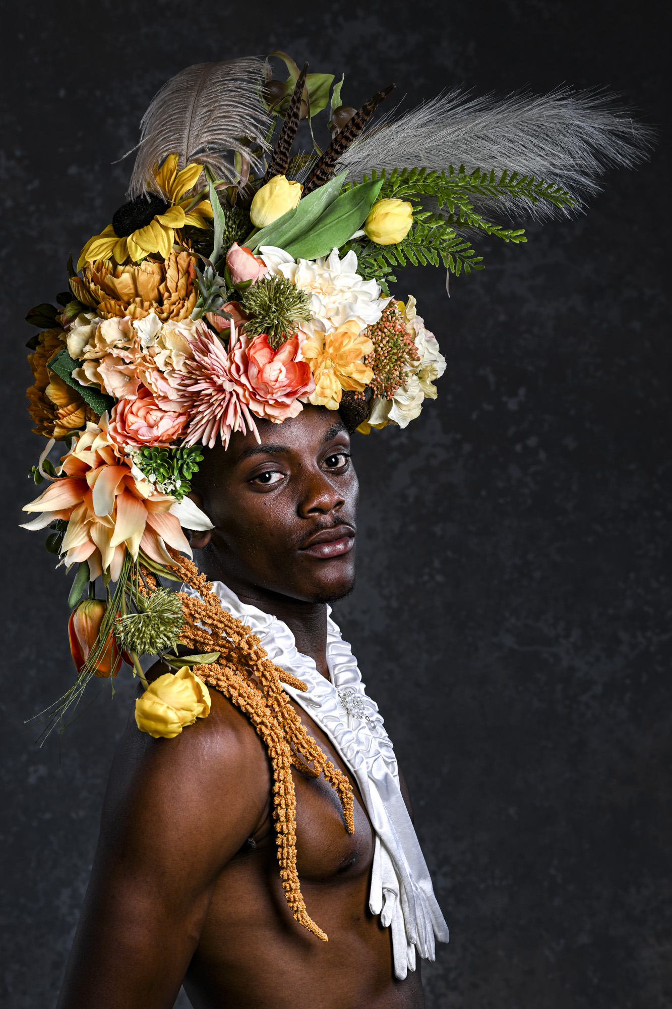 Studio portrait taken with Nikon Z8 of a model with colorful floral headpiece 