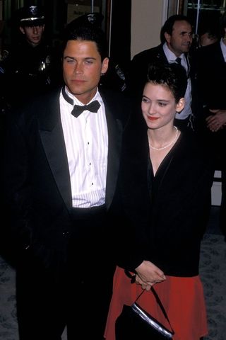 best red carpet looks of the 80s - winona ryder and rob lowe