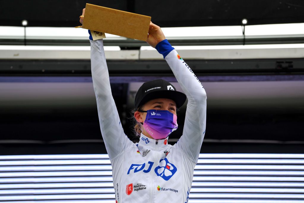 OJO GUAREA SPAIN MAY 22 Niamh FisherBlack of New Zealand and Team SD Worx white best young jersey celebrates at podium during the 6th Vuelta A Burgos Feminas 2021 Stage 3 a 1154km stage from Medina de Pomar to Complejo Krstico de Ojo Guarea 768m Trophy VueltaBurgos BurgosFem UCIWWT on May 22 2021 in Ojo Guarea Spain Photo by Luc ClaessenGetty Images