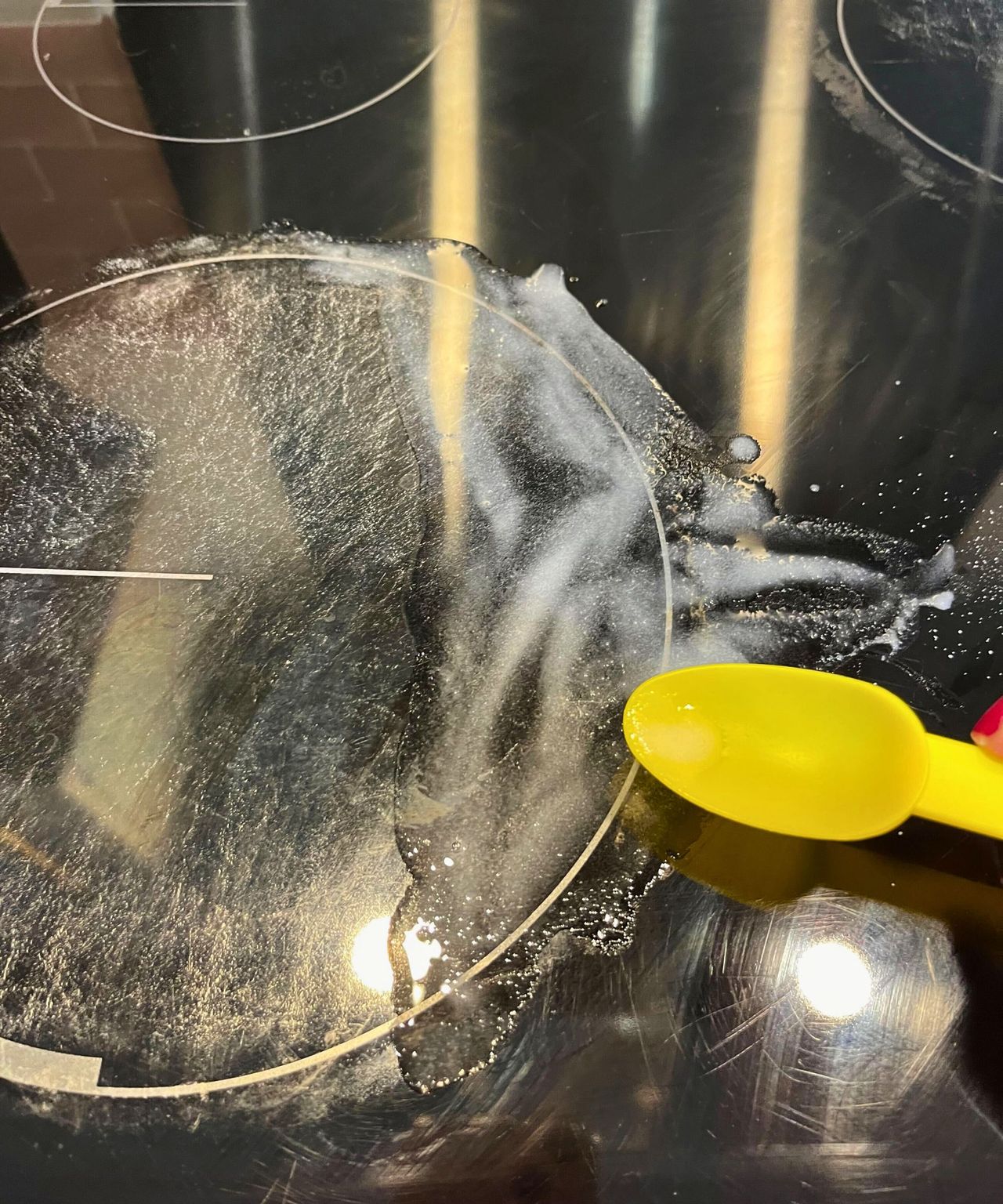I spread the paste gently on the scorch marks