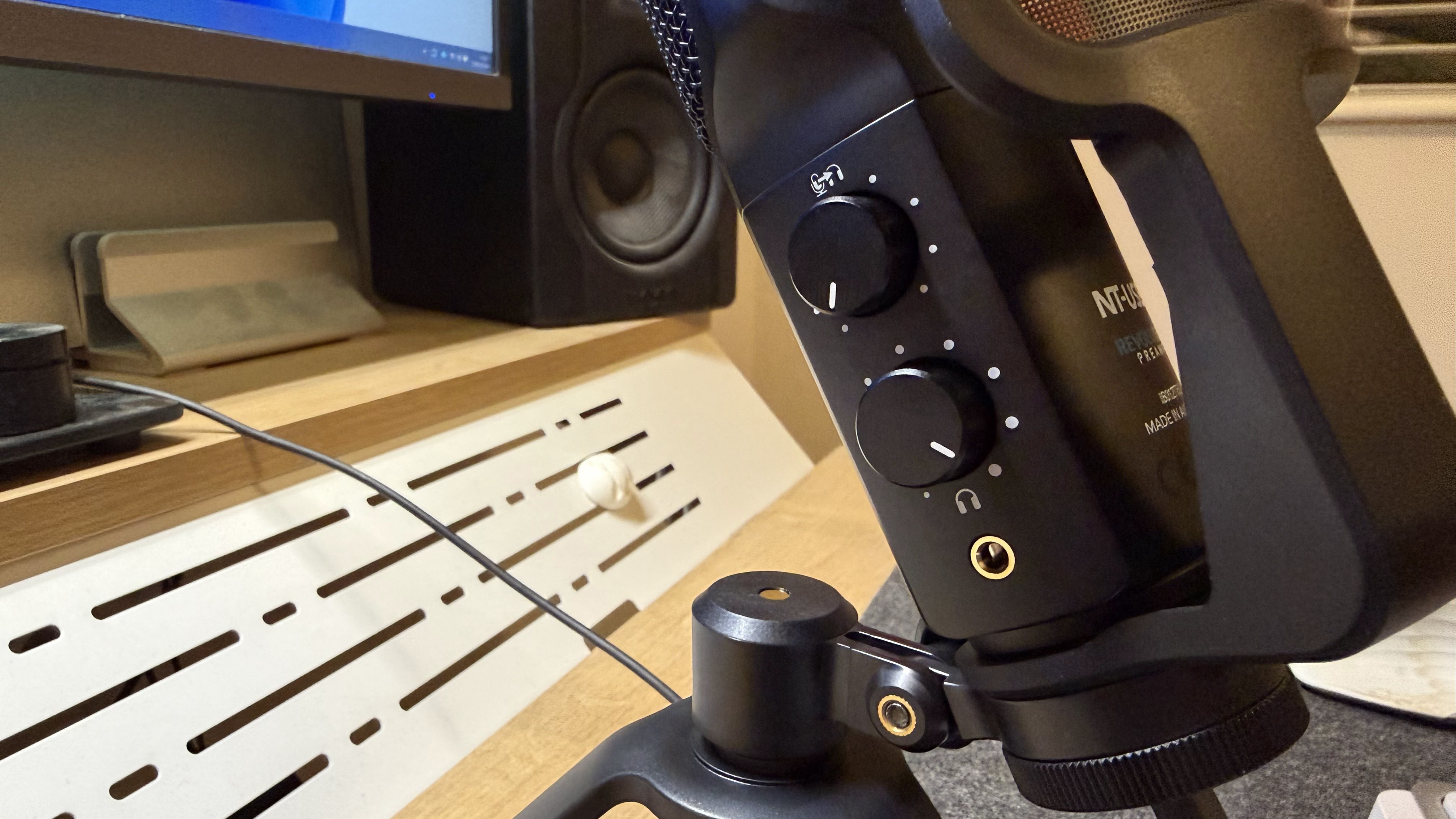 Rode NT-USB+ microphone sat on a desktop