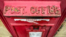 A letter box outside a Post Office branch in Bourton-on-the-Water