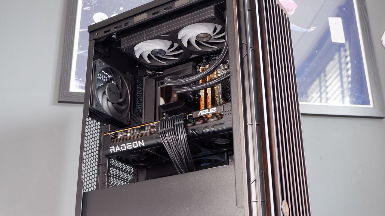 A gaming PC in the process of being built, using Radeon and Ryzen components and an Asus Pro Art PA401 PC case.
