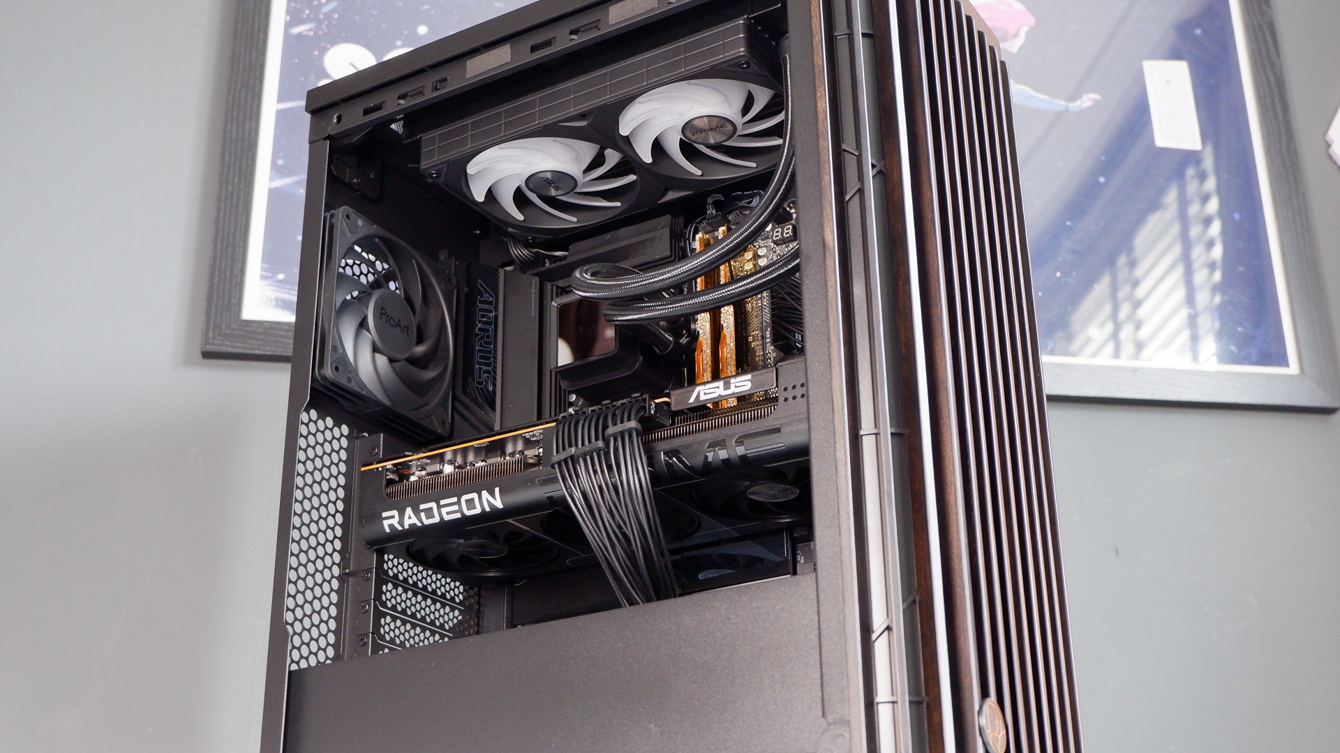 A gaming PC in the process of being built, using Radeon and Ryzen components and an Asus Pro Art PA401 PC case.
