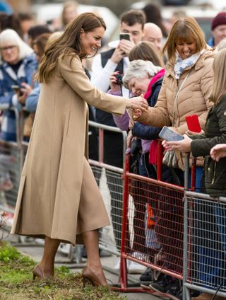 Catherine, Princess of Wales greets members of the public during a visit to The Street, a community hub that hosts local organisations to grow and develop their service, during an official visit to Scarborough on November 03, 2022 in Scarborough, England