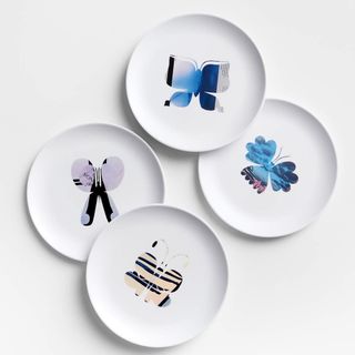 Crate & Barrel decorative plates with butterfly graphic in center