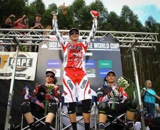 Greg Minnaar celebrates his victory with Aaron Gwin (left) and Mick Hannah (right)
