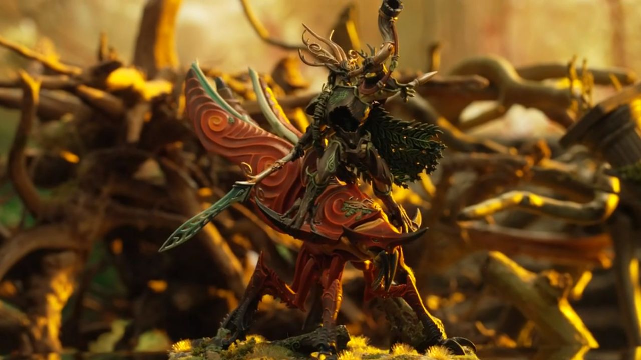A warrior blows a horn atop an insect