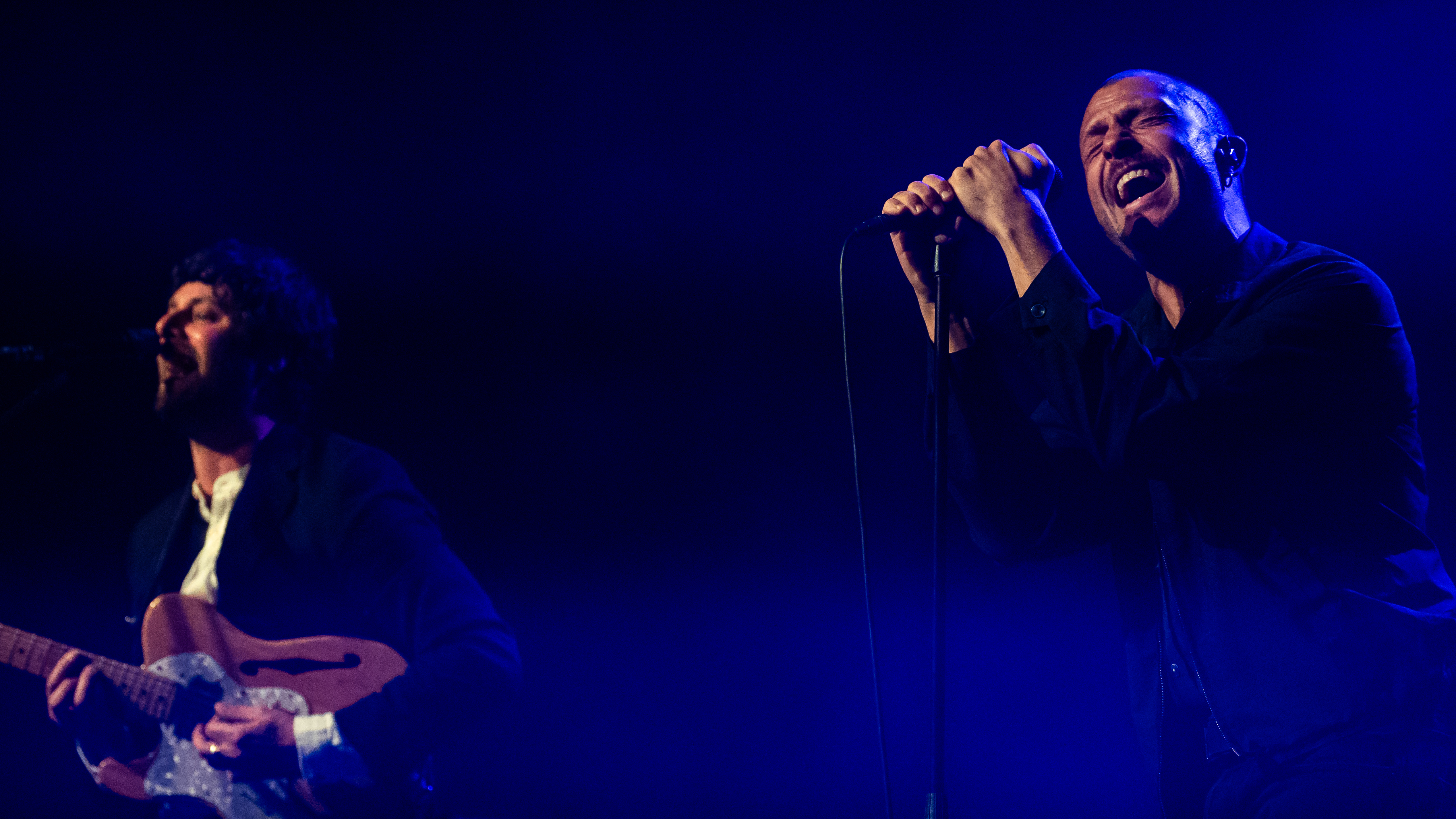 GLASGOW, SCOTLAND - AUGUST 20: Felix White and Orlando Weeks of The Maccabees perform onstage during a concert at The Barrowland Ballroom on August 20, 2025 in Glasgow, Scotland. (Photo by Euan Cherry/Getty Images)